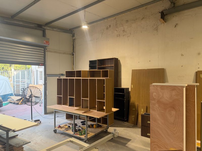 Shelving unit being assembled on a work table