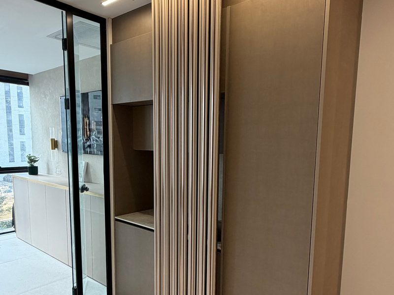 Fluted panel and tall cabinets