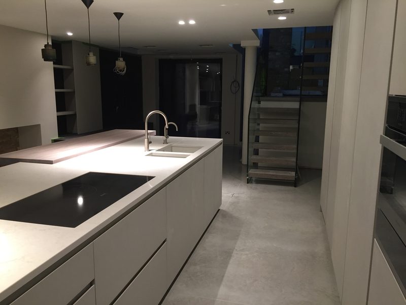 Kitchen island with hob and sink