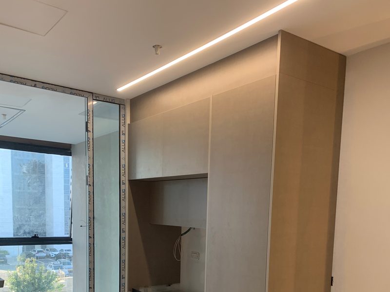 Kitchenette built into tall cabinets
