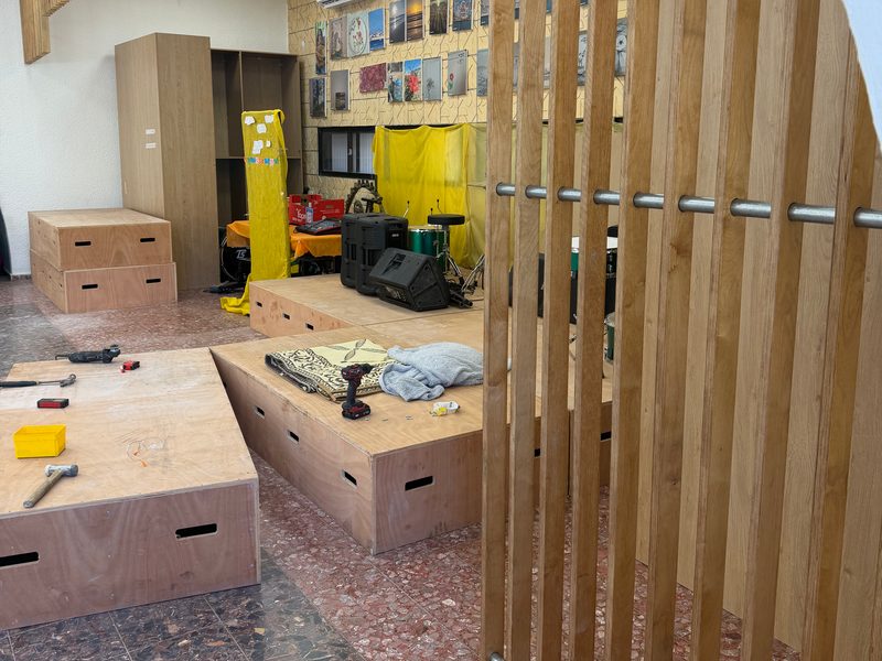 Slatted screen and platform seating, during fit-out
