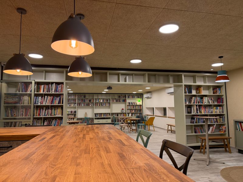 Table and shelving under pendant lights